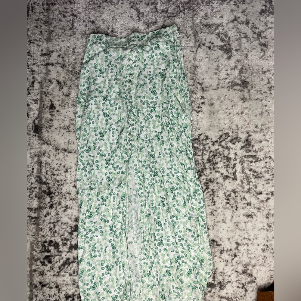 Green leaf print, maxi skirt w/ middle slit . H&M. Button detail up the front.